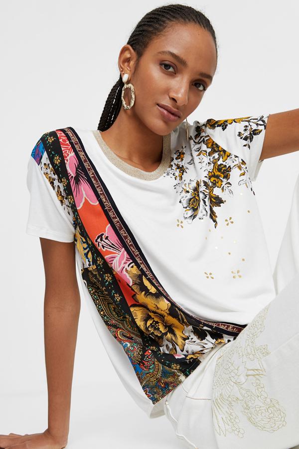 Nos encanta el efecto patchwork de este modelo en tonos ocres que mezcla diferentes estampados, entre ellos las flores. Como proponen en Desigual, te quedará ideal con un vaquero blanco.  Cuesta 49,95 euros.