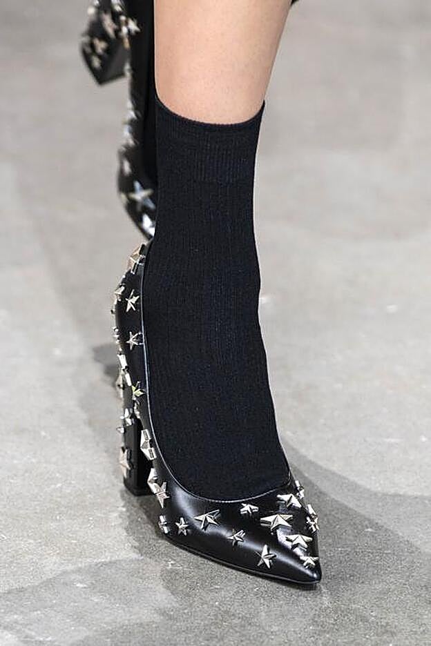 Al tobillo y en negro, de Michael Kors.