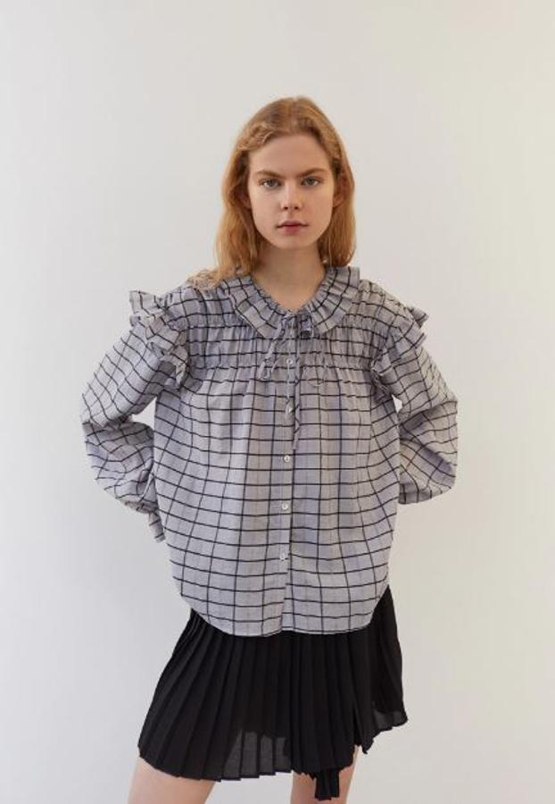 De cuadros en color gris, de Sfera (18,15 euros).