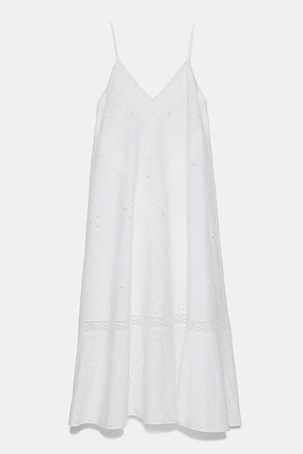 Vestido midi con bordados perforados de la nueva colección de Zara. (59,95 euros).