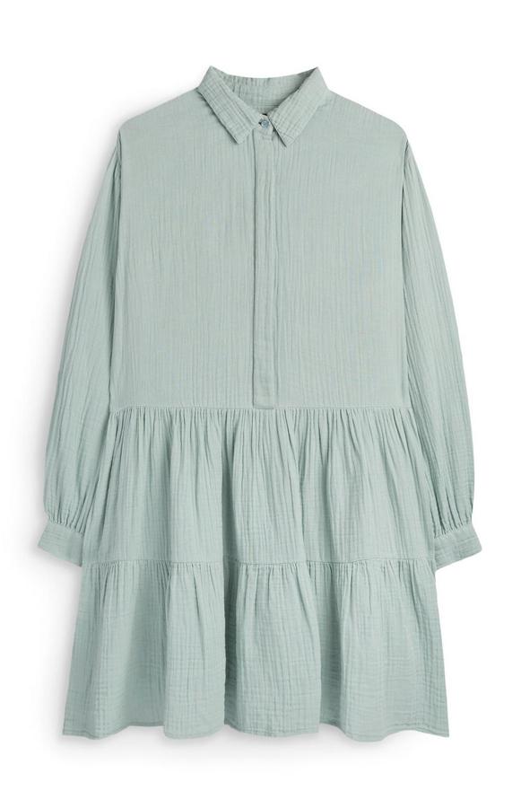 Vestido camisero mini con vuelo, en verde menta, de Primark (22 euros).