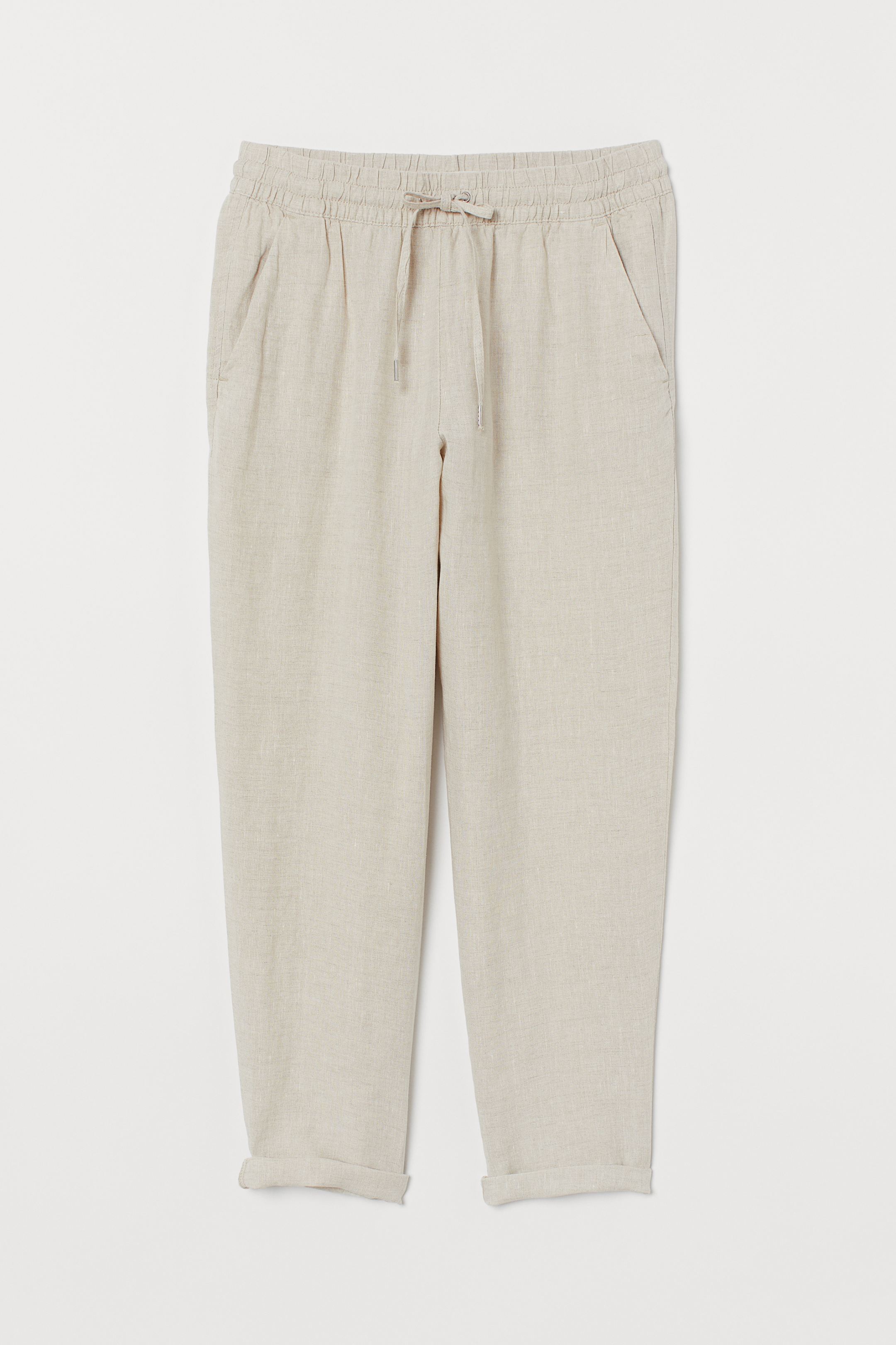 Pantalón de lino tipo jogger en color beige de H&M. (29,99 euros).