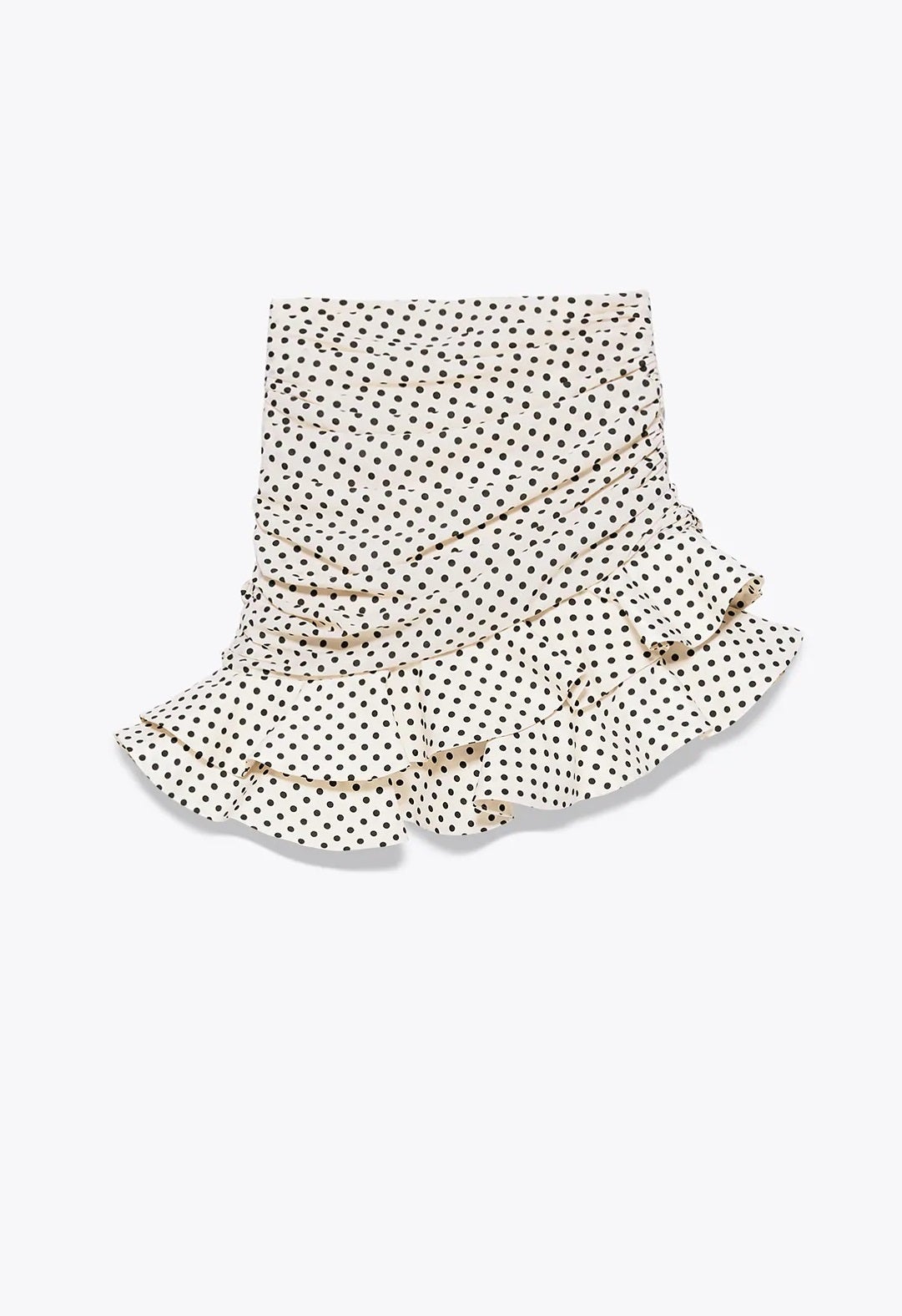 Falda midi de lunares en color vainilla con diseño asimétrico, ceñido y con volantes en el bajo. Una de las prendas más vendidas de Zara esta temporada. ¡Está a punto de agotarse! (39,95 euros).