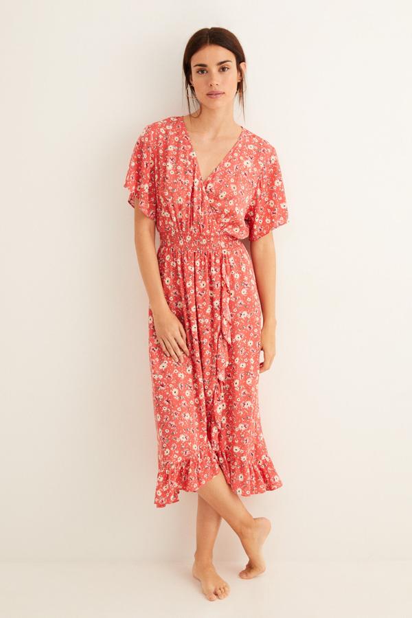 Vestido midi de cinturilla elástica, de las rebajas de Women'secret (16,99 €).