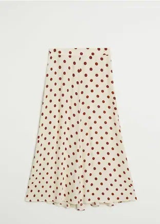Falda midi con estampado de lunares de Mango. Puro estilo y sofisticación. (25,99 euros).