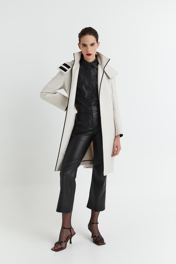 Parka de algodón encerado con capucha, de Sfera (79,99 €).