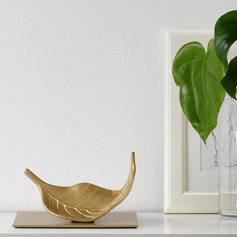 Esta figura decorativa de bronce con forma de hoja tiene una medida de 10 centímetros y un precio de 9 euros.