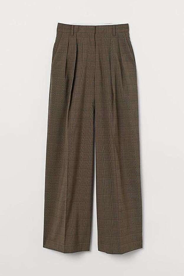 Fastuosos pantalones marrones con estampado de cuadros de H&M.