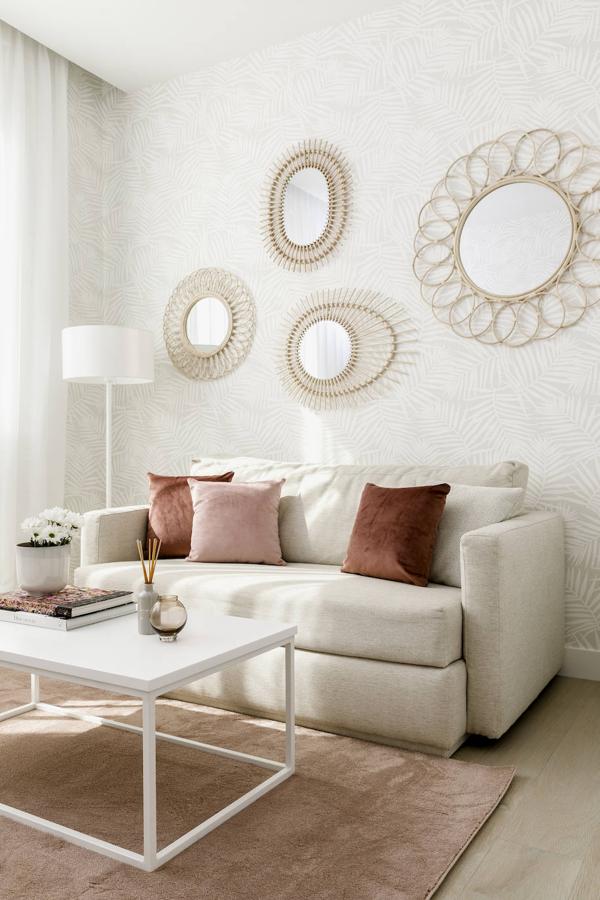Los colores pastel, el juego de texturas y la geometría de líneas minimal son los protagonistas de los rincones más especiales de la casa de Paula Echevarría, como podemos ver en esta zona de estar que invita al descanso y al relax.