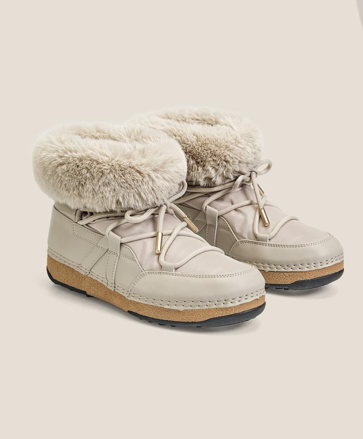 Botines de nieve en color beige con pelito por dentro, de Ousho (59,99 euros).