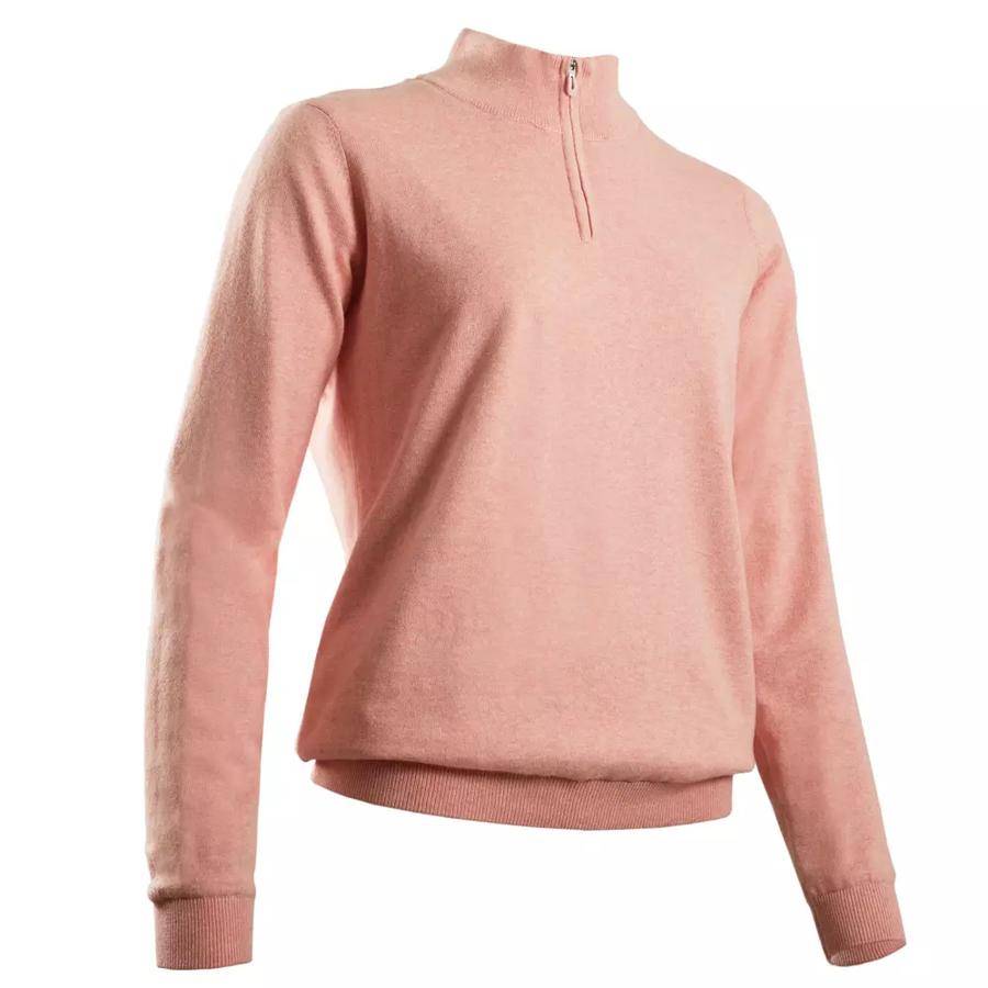 Este jersey rosa está pensado para jugar al golf, pero es perfecto para protegernos del frío con estilo. Incorpora una membrana cortavientos.