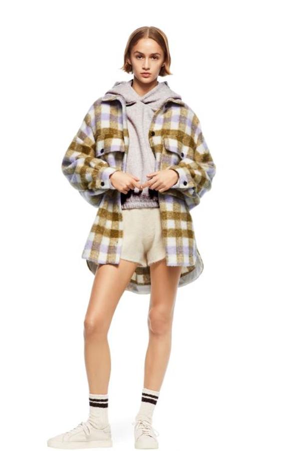 Y esta, más gordita y en tonos tierra y malva, pasa de 49.95 a 25.99 euros en los Special Prices de Zara.