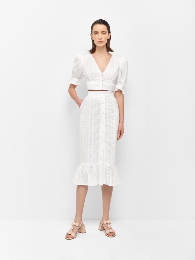 Otro de sus diseños similar al anterior, pero en color blanco.