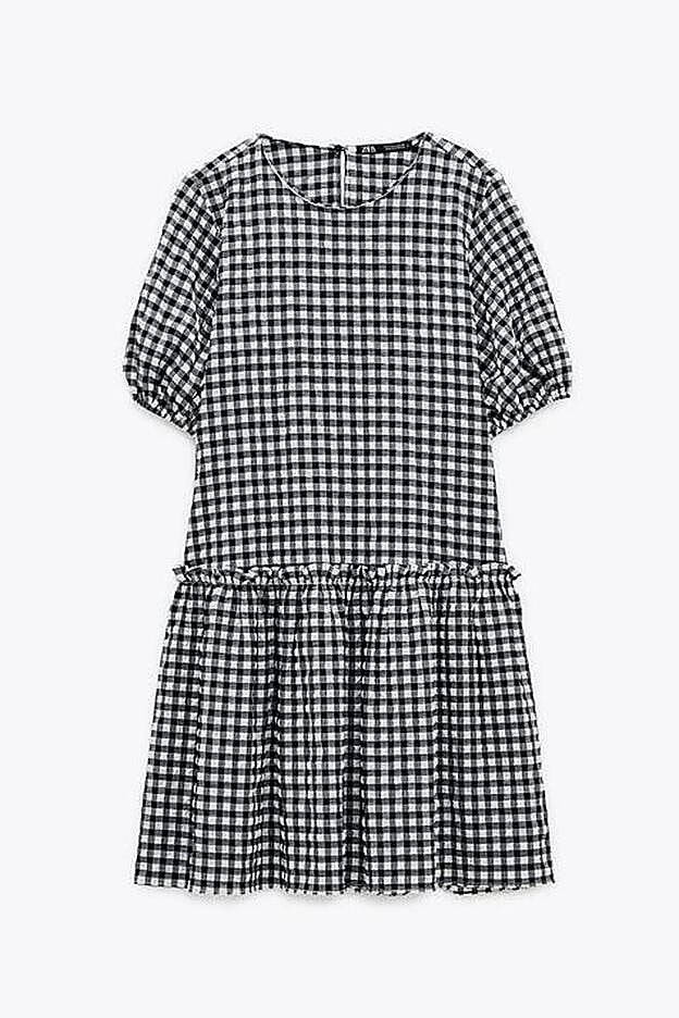 Con manga cora abullonada y volante en el bajo, este vestido será uno de tus favoritos esta temporada.