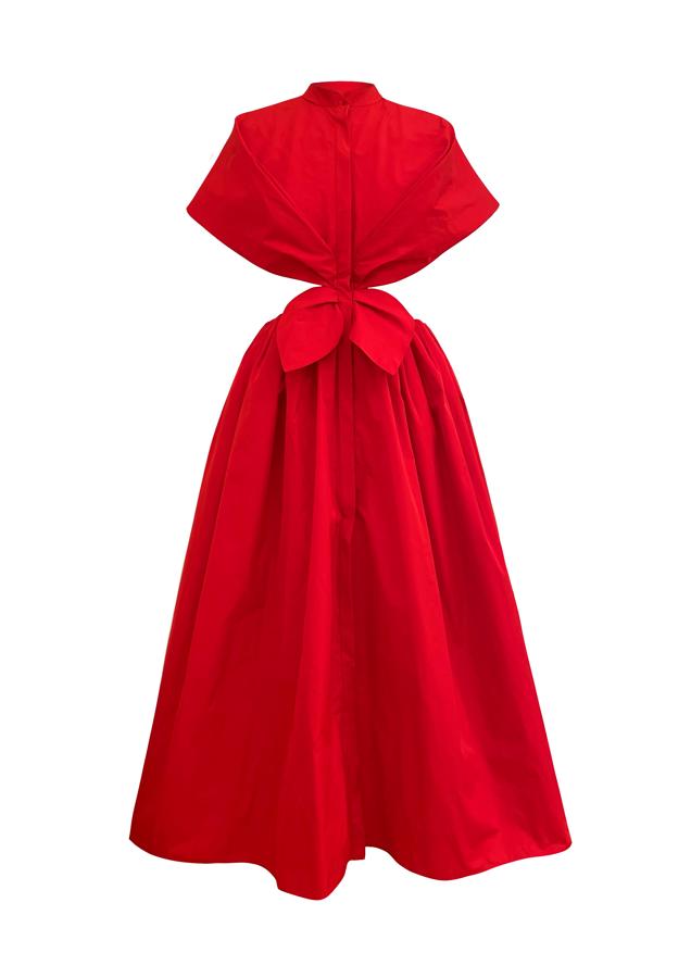 Midi con aberturas y lazada en el cuerpo, de Candelas y Felipa (700 euros).