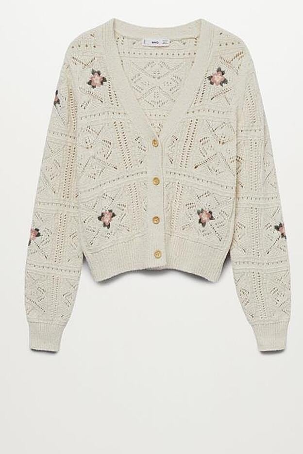 Con escote de pico y cierre de botones, el cárdigan resulta de lo más práctico y podrás combinarlo con todo.