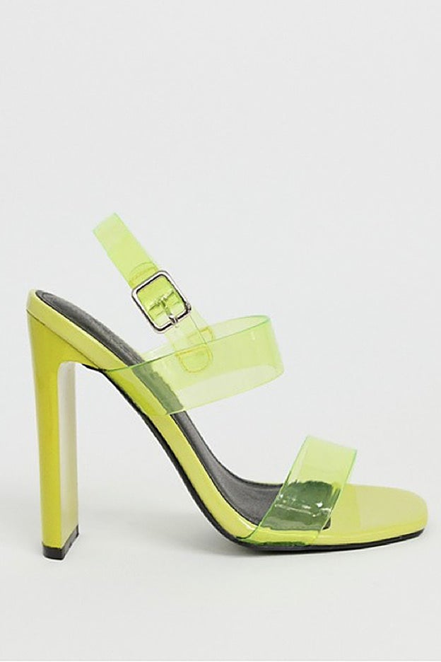 Sandalias de tacón verde neón con tiras transparentes de Truffle Collection.