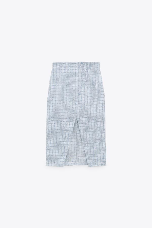 Falda cruzada de tweed, de Zara (29,95 €).