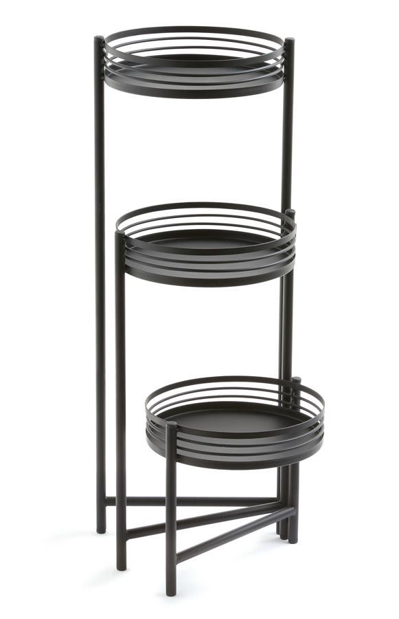 En color negro, este macetero de tres alturas con bases redondas tiene un precio de 17 euros.