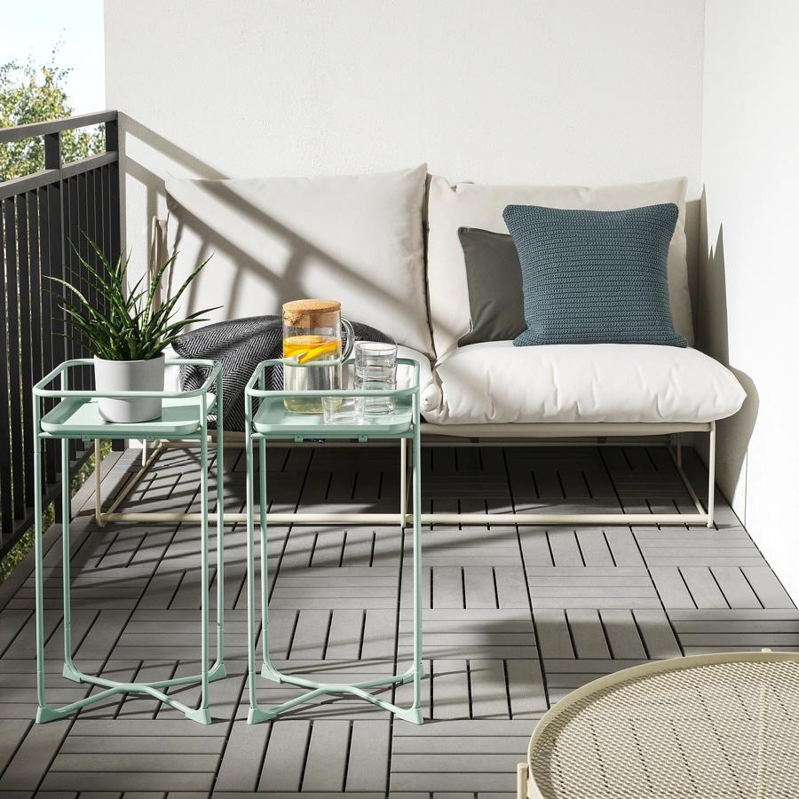 Disponible en verde y beige, este soporte para plantas, que también puede utilizarse como mesa auxiliar tiene un precio de 25 euros.