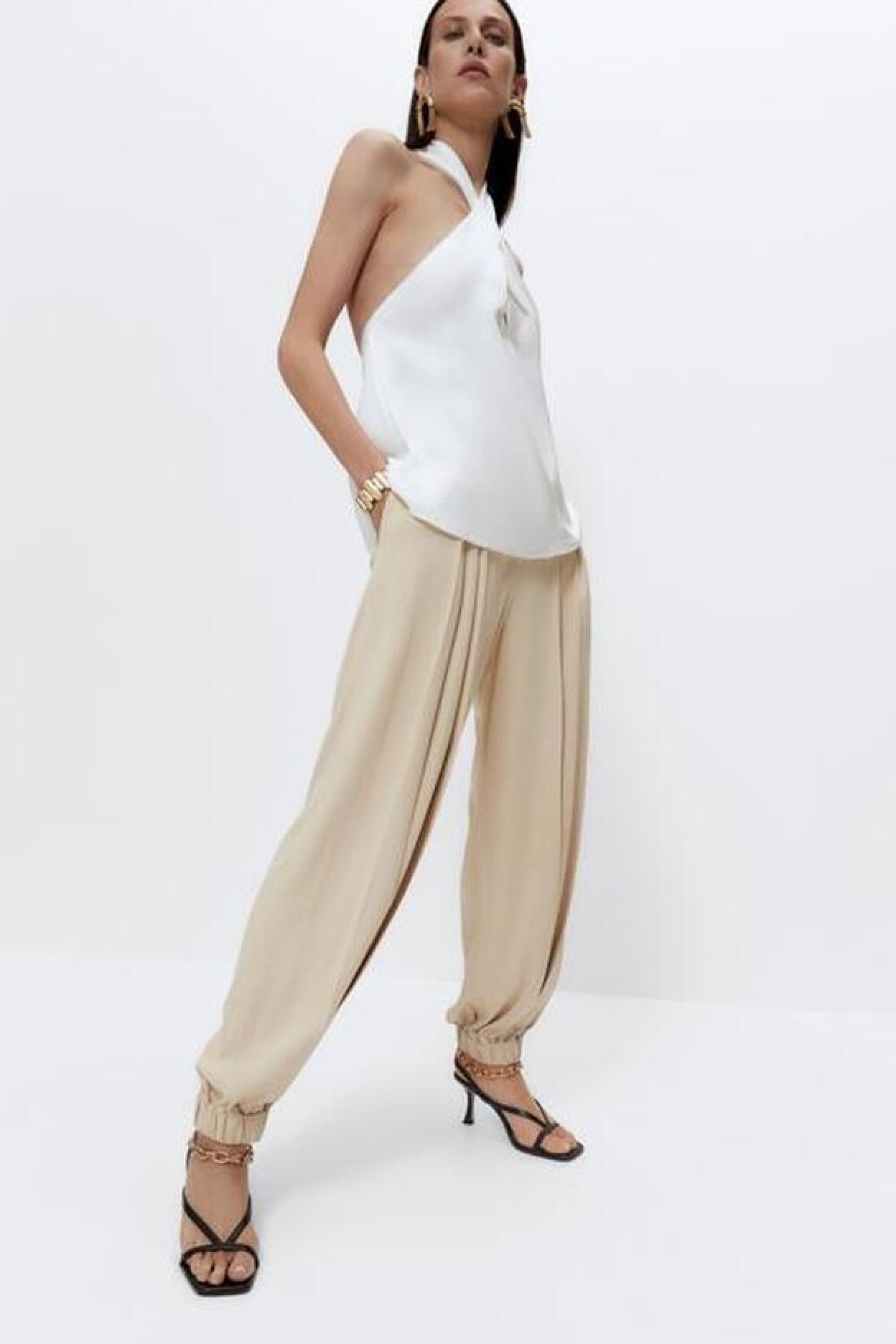 Pincha en la imagen para descubrir 7 pantalones anchos con cintura alta de Uterqüe que sientan de maravilla y son comodísimos.