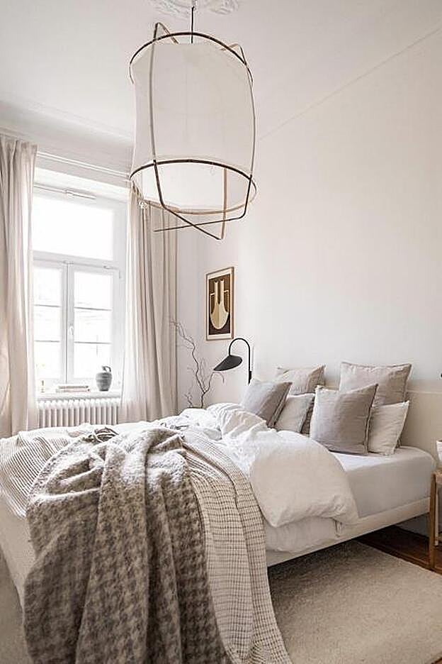 Dormitorio de estilo nórdico.