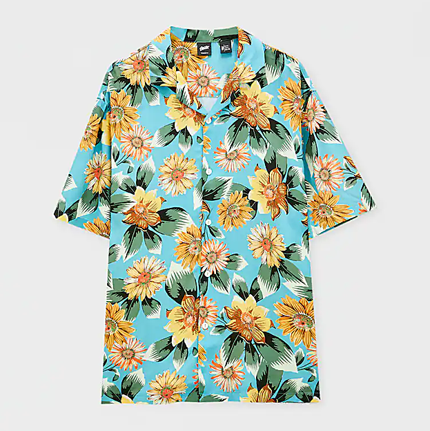 Camisa en viscosa, de color turquesa, con estampado de girasoles