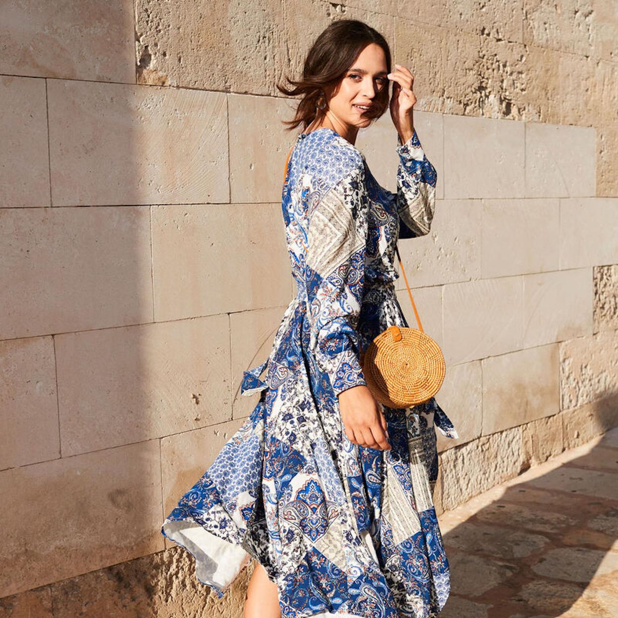 Pincha en la foto para ver los vestidos con la espalda al aire con los que triunfarás.