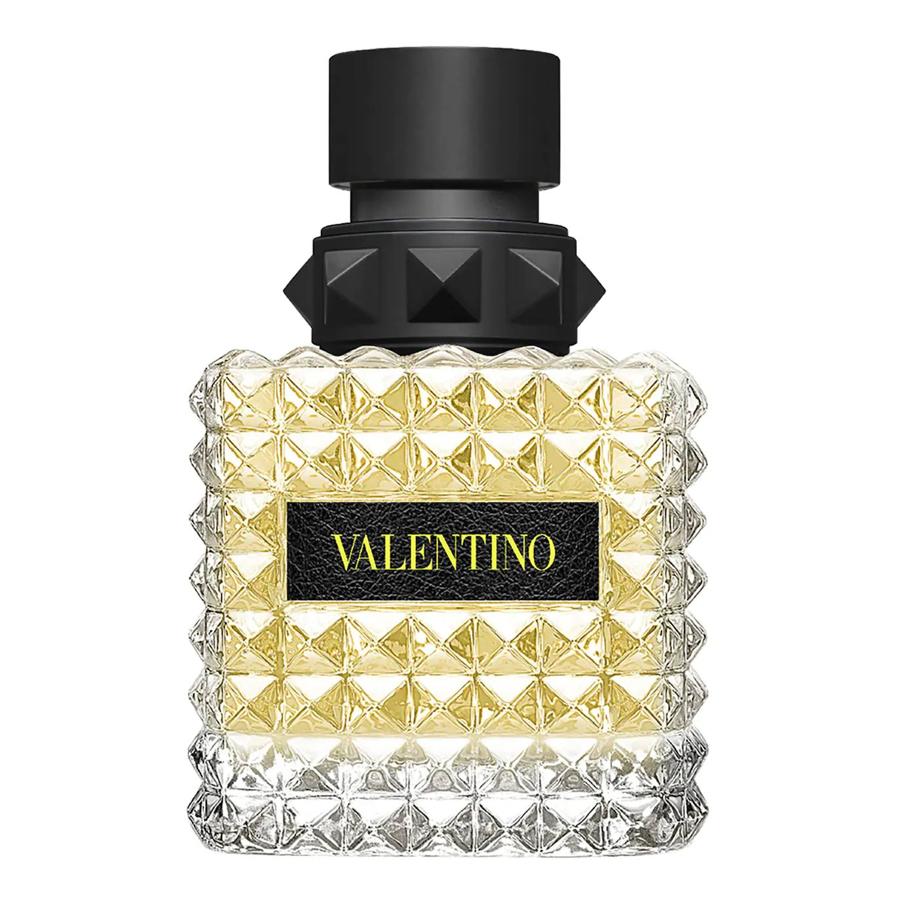 Un perfume floral almizclado, refrescante y ligeramente picante con suaves notas de limón italiano, pétalos de rosa y madera de cedro. 