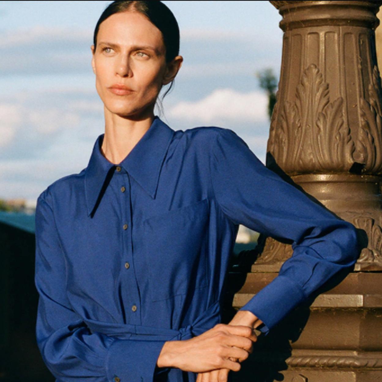 Pincha en la imagen para descubrir los vestidos midi negros que son la tendencia más fuerte de las nuevas colecciones.