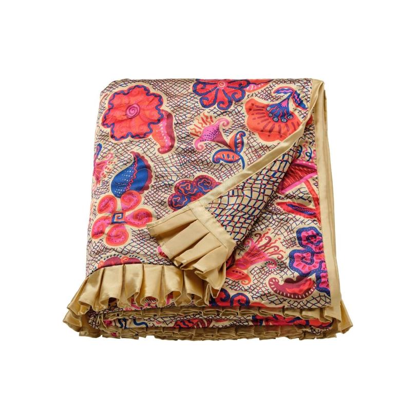 Manta con estampado floral de poliéster (40 euros).