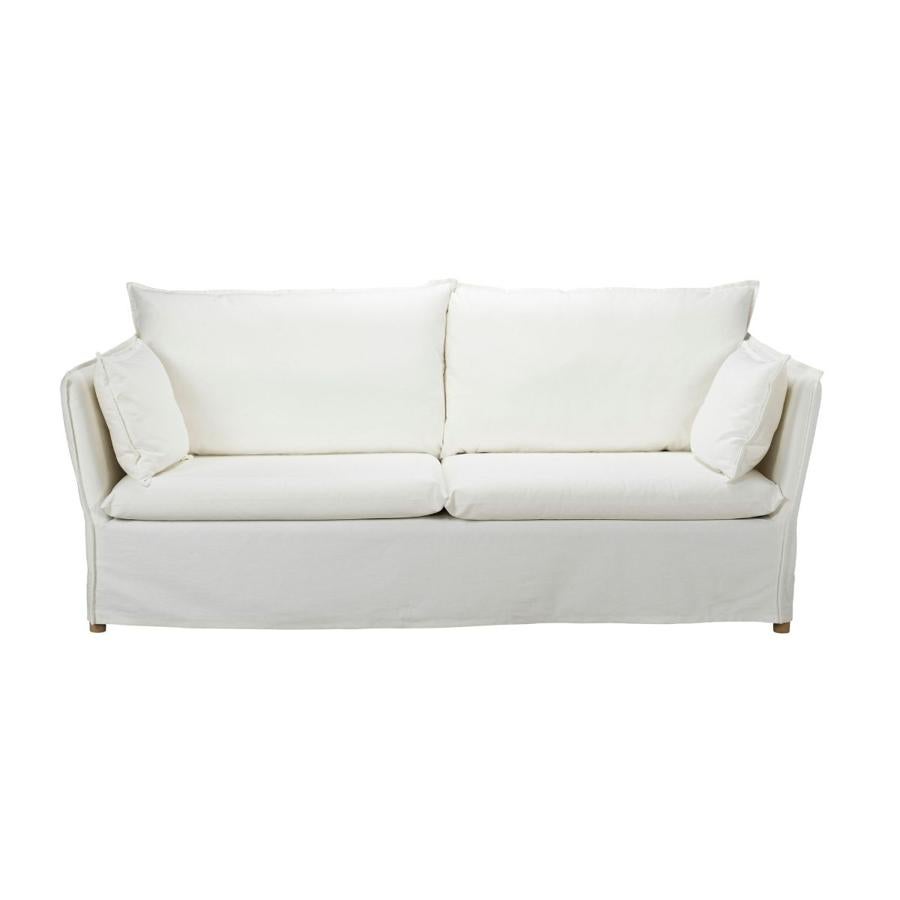 Sofá de 3 plazas en color crudo con fundas de algodón 100%. Tiene un precio de 369 euros.