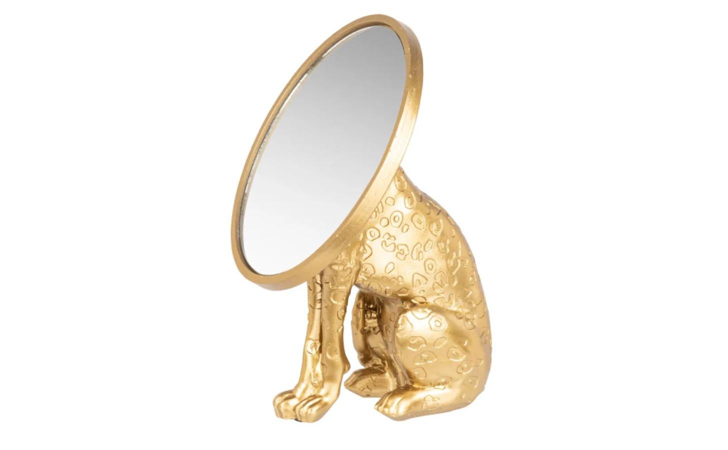 Espejo dorado con cuerpo de leopardo y medidas de 15x21 centímetros. 14,99 euros.