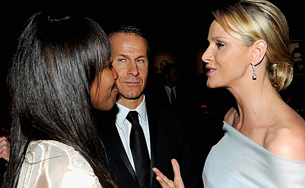 La princesa Charlène, conversando con Naomi Campbell y su novio, el billonario ruso Vladislav Doronin, en 2011.