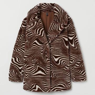 Imagen secundaria 1 - Los abrigos de pelo más sofisticados y calentitos del invierno para derrochar glamour a diario