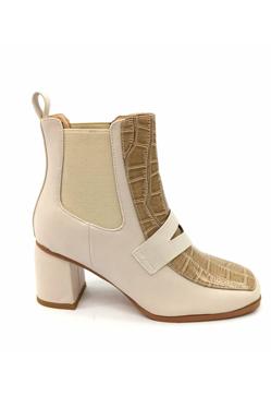 Imagen secundaria 2 - Las botas tipo mocasín, la original tendencia que ya ha llegado a Sfera y Mango (y a la que no te vas a poder resistir)