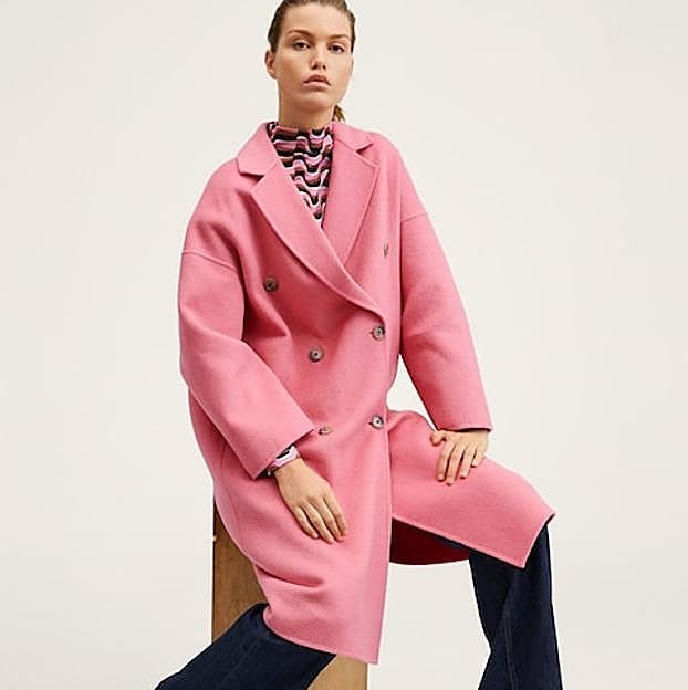 Imagen principal - Abrigo de lana hecho a mano con doble botonadura en color rosa de Mango (119,99 euros). 