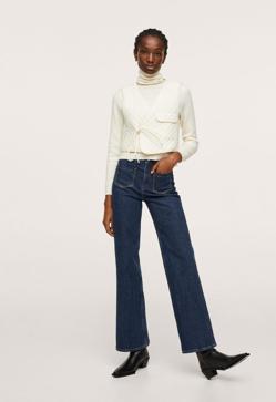 Imagen secundaria 2 - 1. María Pombo con un total look de Mango con cárdigan estampado y vaqueros con bolsillos. 2. Chaqueta de punto con cuadros en azul y negro de Mango (29,99 euros). 3. Vaqueros anchos en denim oscuro de Mango (29,99 euros). 