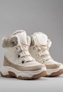 Imagen secundaria 2 - De Lefties a Oysho: el truco de Olivia Palermo para ir con estilo en invierno son estos botines tan calentitos y aptos para futuras Filomenas