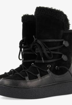 Imagen secundaria 2 - De Lefties a Oysho: el truco de Olivia Palermo para ir con estilo en invierno son estos botines tan calentitos y aptos para futuras Filomenas