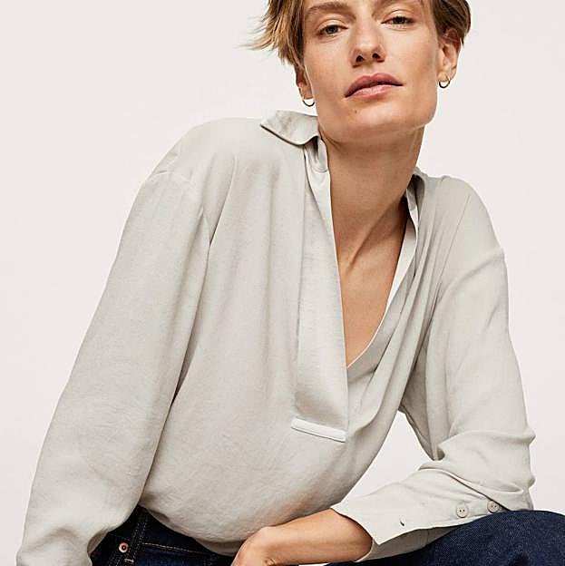 Imagen principal - Estas son las camisas satinadas de colores rebajadas por menos de 20 euros para que tus looks con vaqueros siempre sean de 10