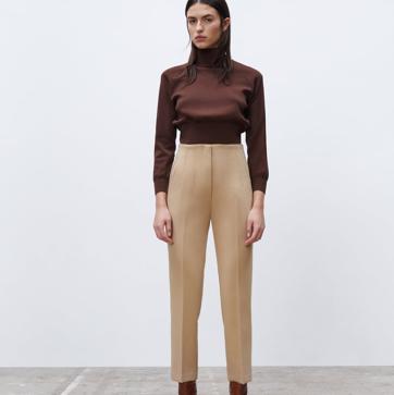 Imagen secundaria 1 - 1. Pantalón de tiro alto y corte recto de la nueva colección de primavera de Zara (25,99 euros). Disponible en 9 colores que van desde los clásicos beige o gris a los tonos más atrevidos como el ciruela. 