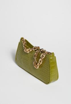 Imagen secundaria 2 - 1. Bolso de asa corta con piel grabada de color verde de Mango (19,99 euros). 2. Bolso estilo baguette con acabado metalizado de Mango (29,99 euros). 3. Bolso con cadena dorada y piel efecto cocodrilo de Sfera (16,99 euros). 