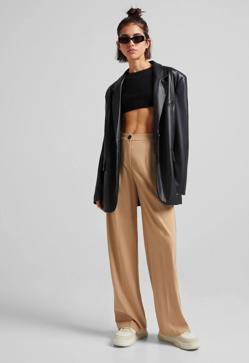 Imagen secundaria 2 - Los pantalones que necesitas para mejorar tus looks de oficina son estos de traje cómodos y elegantes super low cost