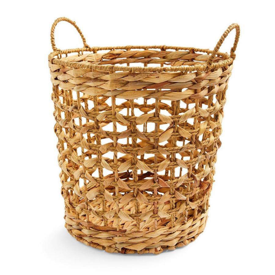 Nos encantan las cestas de almacenaje. Y si están elaboradas con fibras naturales como el ratán, más todavía. Precio: 14 euros.