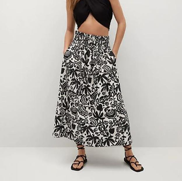 Imagen principal - Las faldas midi de menos de 15 euros de Mango Outlet cómodas, fresquitas y ponibles que no puedes dejar escapar