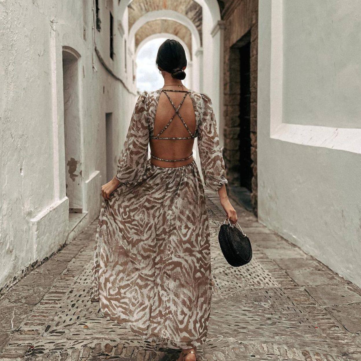 Pincha en la foto para ver otros vestidos de flores para apuntarte a la tendencia estrella de la primavera y dar con tu look favorito de la temporada