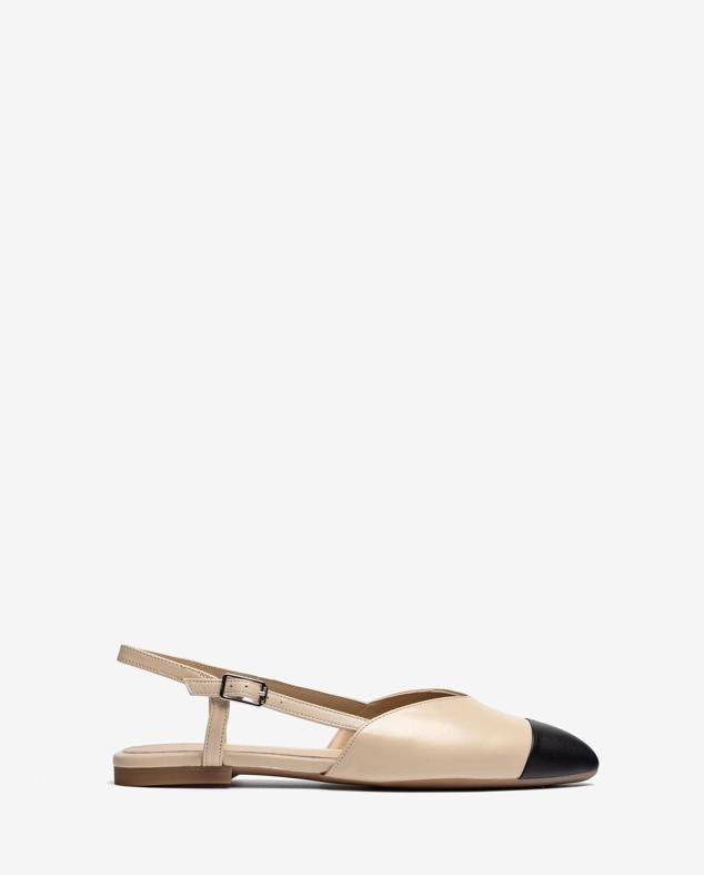 Son planas, cómodas y todoterreno. Las bailarinas son el as bajo la manga de cualquier armario. Además, son tan prácticas y finas que siempre podrás llevarlas en el bolso. Para verano, los mejores modelos son los destalonados. Y para un toque más francés, apuesta por modelos como este de Unisa (89,90€).