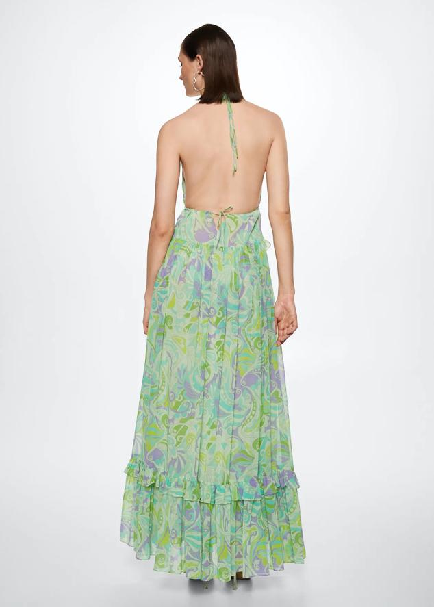 Vestido de gasa con estampado multicolor en tonos verdes y lavanda.Cuenta con la espalda abierta, escote pronunciado y tirantes muy finos (89,99 euros).