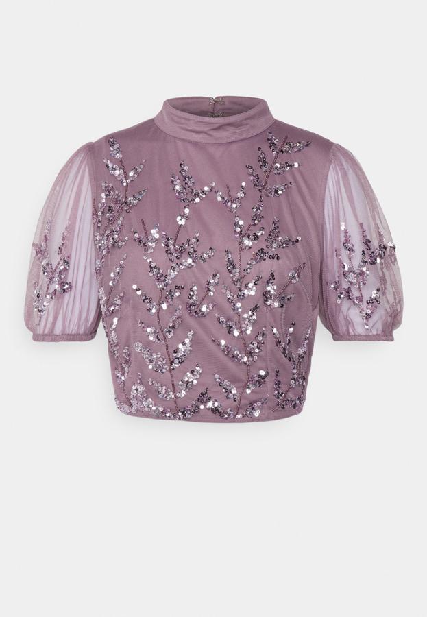 Romántico y sofisticado, así es el top joya para las mujeres más elegantes que lo lucirán hasta con vaqueros. Es de Maya Deluxe. Precio: 69,95 €. 